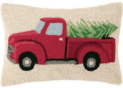 Dog in red truck wool pillow.